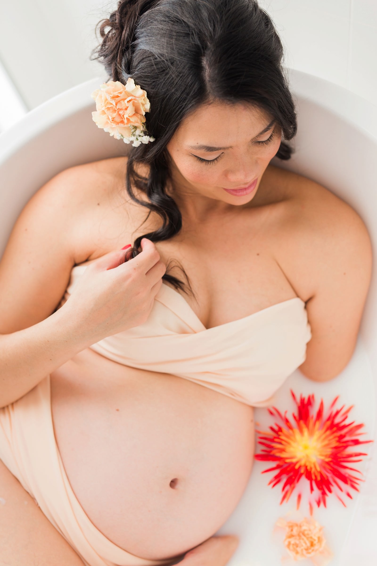 Milk bath pregnancy photoshoot by Mario Colli Photography