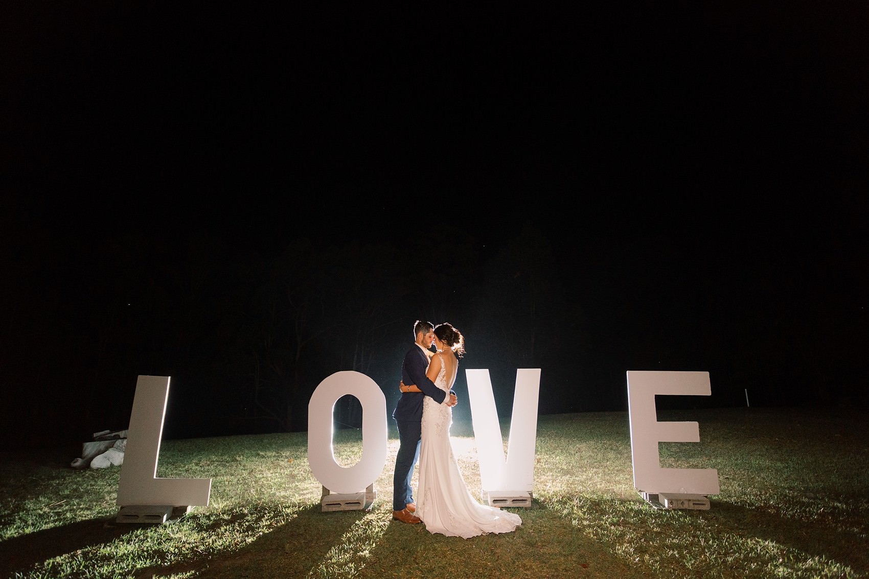 love sign night photo at austinvilla estate