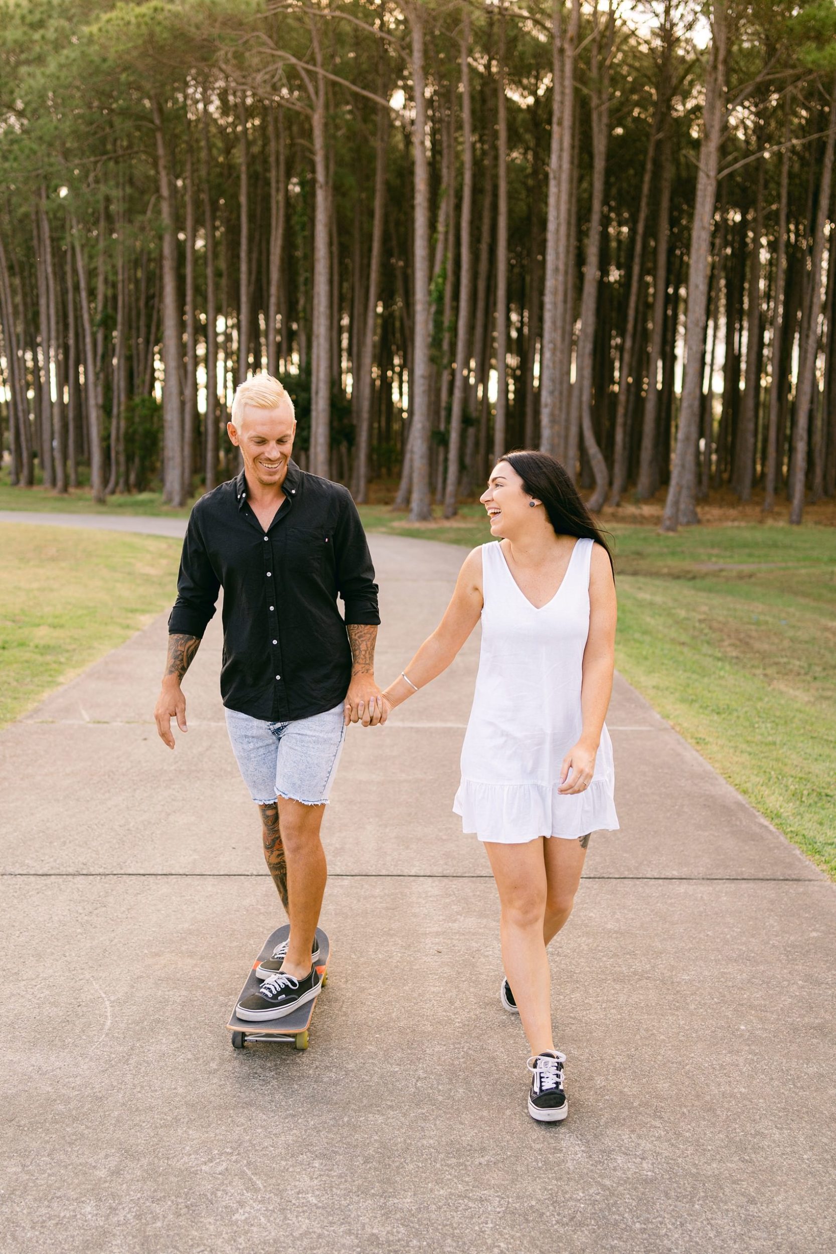 tattooed couple and skateboard photo on the gold coast