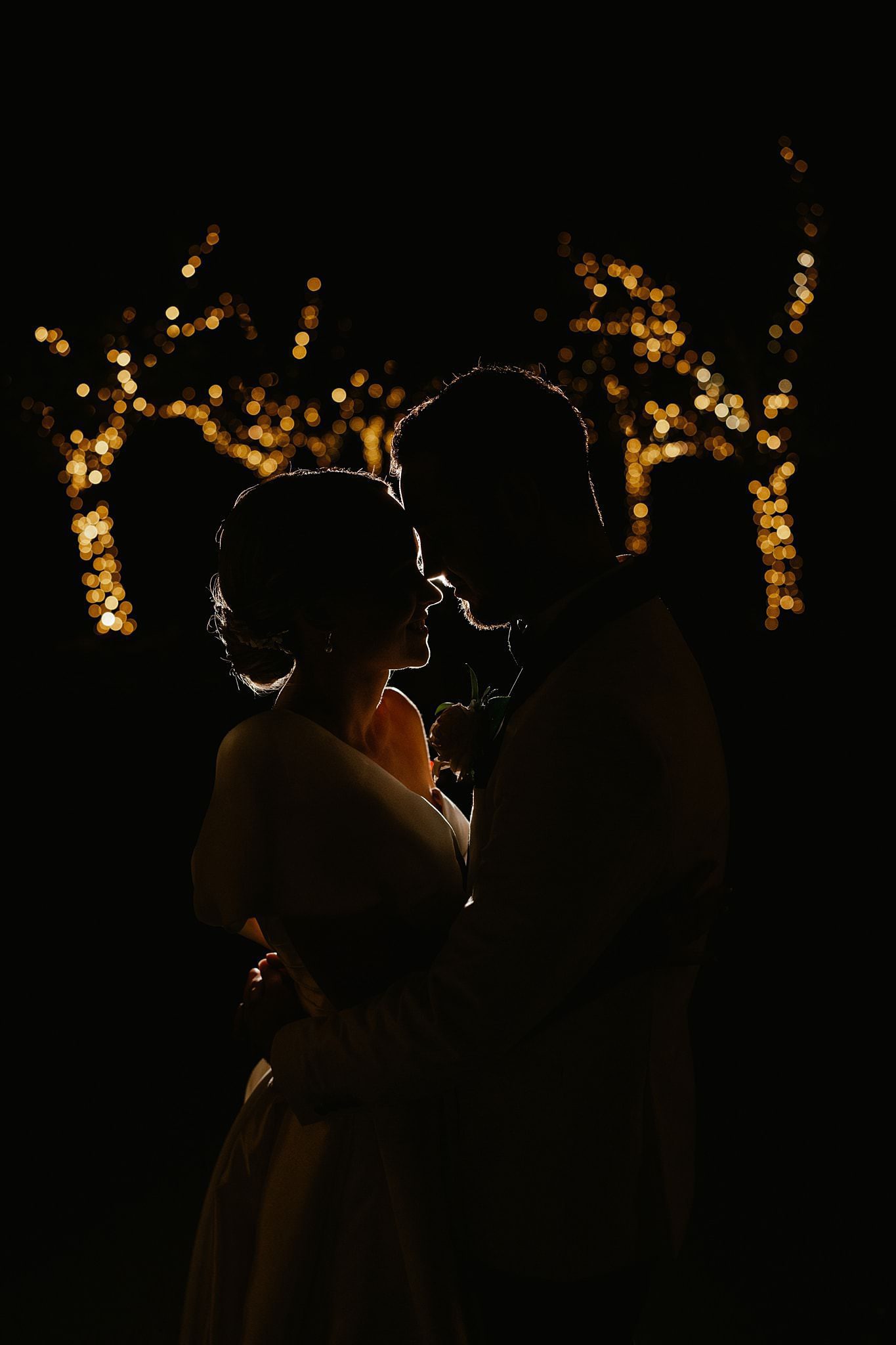 night photo of bride and groom at preston peak
