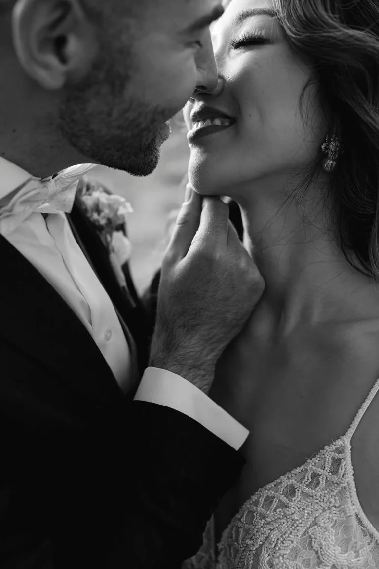 close up bride and groom kissing